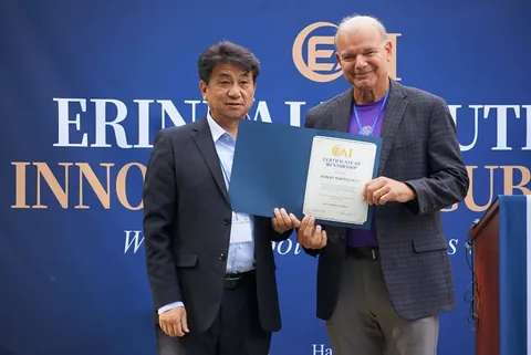 A mentor certificate presentation at the launch celebration.